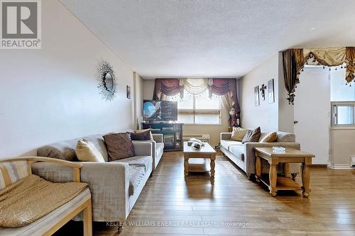 407 - 2835 Islington Avenue, Toronto, ON - Indoor Photo Showing Living Room