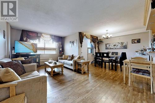 407 - 2835 Islington Avenue, Toronto, ON - Indoor Photo Showing Living Room