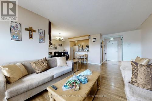 407 - 2835 Islington Avenue, Toronto, ON - Indoor Photo Showing Living Room