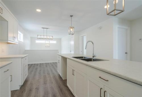 26 Gullane Street, Niverville, MB - Indoor Photo Showing Kitchen With Double Sink