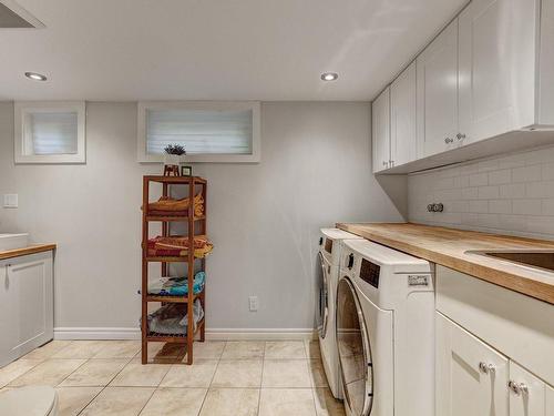 Salle de lavage - 17 Av. Jasper, Mont-Royal, QC - Indoor Photo Showing Laundry Room