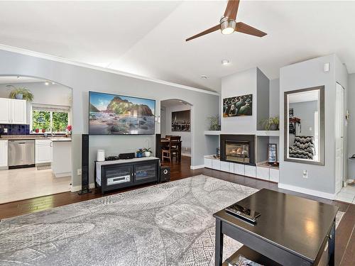 1050 Mclaughlin Pl, Qualicum Beach, BC - Indoor Photo Showing Living Room With Fireplace