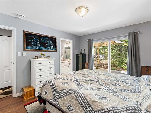 1050 Mclaughlin Pl, Qualicum Beach, BC - Indoor Photo Showing Bedroom