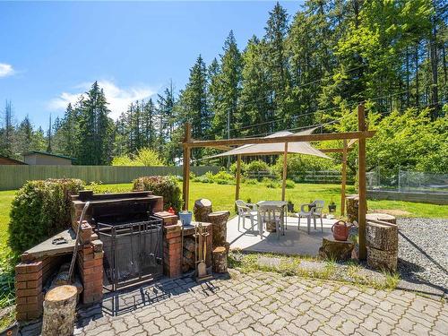 1050 Mclaughlin Pl, Qualicum Beach, BC - Outdoor With Deck Patio Veranda