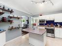 1050 Mclaughlin Pl, Qualicum Beach, BC  - Indoor Photo Showing Kitchen With Double Sink 