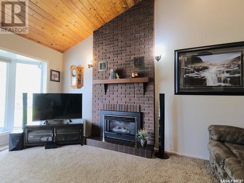 813 Ridpath Road, Rosetown, SK - Indoor Photo Showing Living Room With Fireplace