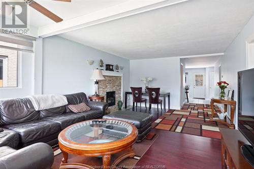 7045 Riverside Drive East, Windsor, ON - Indoor Photo Showing Living Room With Fireplace