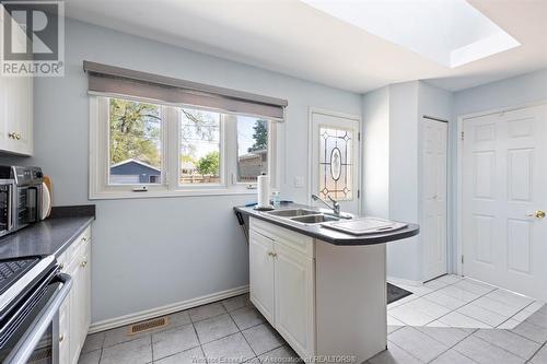 7045 Riverside Drive East, Windsor, ON - Indoor Photo Showing Kitchen With Double Sink