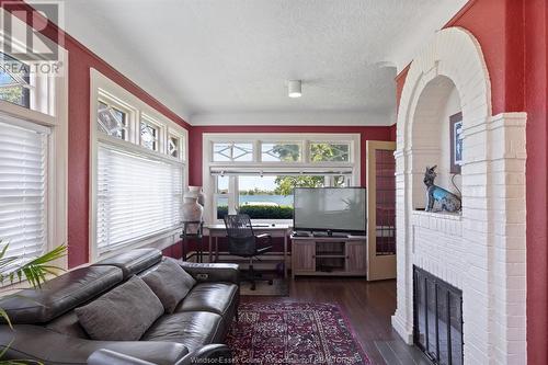 7505 Riverside Drive East, Windsor, ON - Indoor Photo Showing Other Room With Fireplace