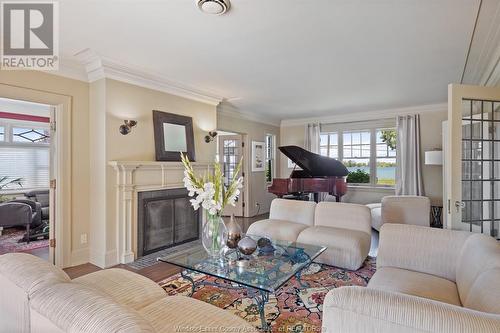 7505 Riverside Drive East, Windsor, ON - Indoor Photo Showing Living Room With Fireplace