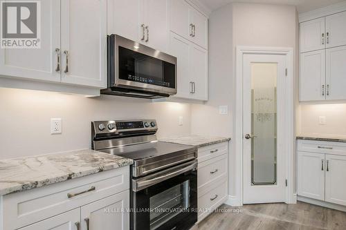 312 Keeso Lane, North Perth, ON - Indoor Photo Showing Kitchen With Upgraded Kitchen