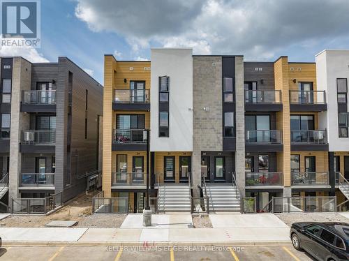 26 - 261 Woodbine Avenue, Kitchener, ON - Outdoor With Balcony With Facade