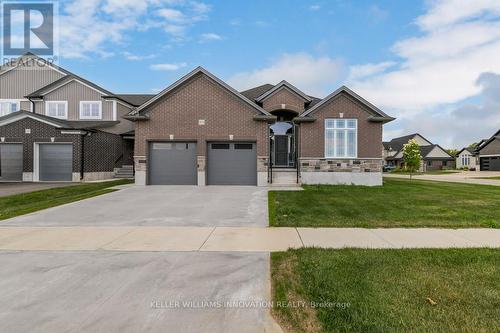 705 Hollinger Drive S, North Perth, ON - Outdoor With Facade