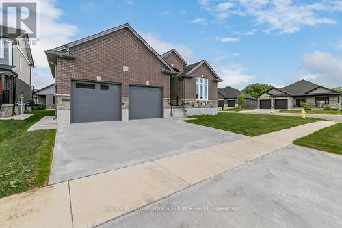 705 Hollinger Drive S, North Perth, ON - Outdoor With Facade