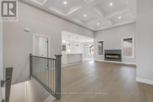 705 Hollinger Drive S, North Perth, ON - Indoor Photo Showing Other Room With Fireplace