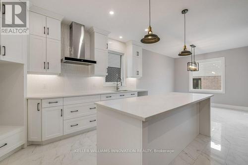 705 Hollinger Drive S, North Perth, ON - Indoor Photo Showing Kitchen With Upgraded Kitchen