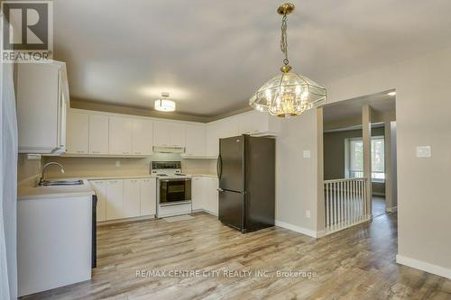 52 - 25 Erica Crescent, London, ON - Indoor Photo Showing Kitchen With Double Sink