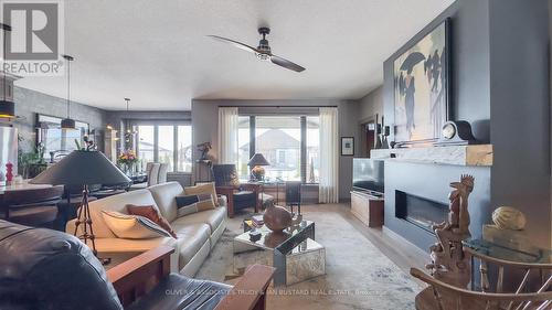 68 Deerfield Road, Lambton Shores (Grand Bend), ON - Indoor Photo Showing Living Room With Fireplace