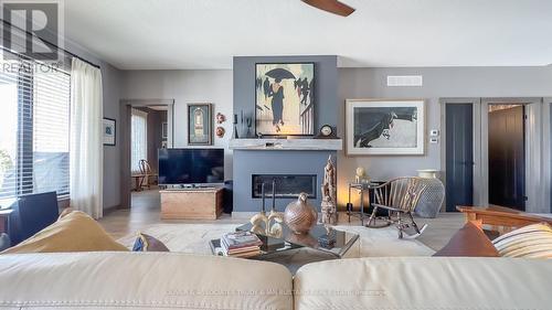 68 Deerfield Road, Lambton Shores (Grand Bend), ON - Indoor Photo Showing Living Room With Fireplace