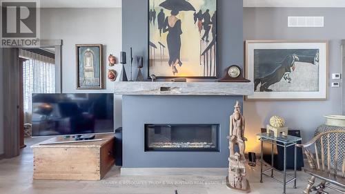 68 Deerfield Road, Lambton Shores (Grand Bend), ON - Indoor Photo Showing Living Room With Fireplace