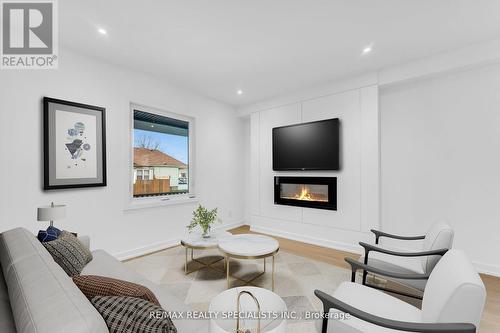 90 Frederick Avenue, Hamilton, ON - Indoor Photo Showing Living Room With Fireplace