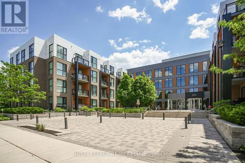 214 - 210 Sabina Drive, Oakville, ON - Outdoor With Balcony With Facade