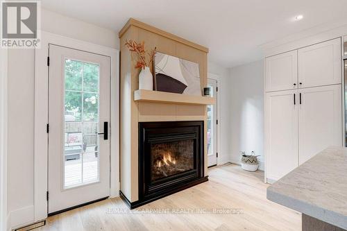 939 Teal Drive, Burlington (Lasalle), ON - Indoor Photo Showing Living Room With Fireplace