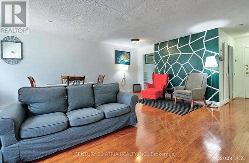 135 - 4001 Don Mills Road, Toronto, ON - Indoor Photo Showing Living Room