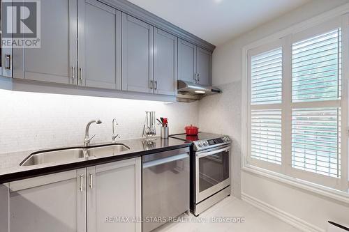 11 Mallingham Court, Toronto, ON - Indoor Photo Showing Kitchen With Double Sink