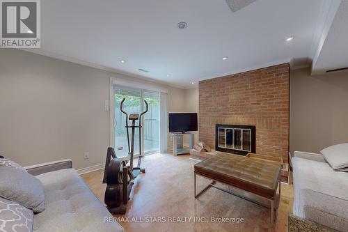 11 Mallingham Court, Toronto, ON - Indoor Photo Showing Living Room With Fireplace