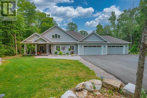 228 Riverside Drive, Kawartha Lakes, ON - Outdoor With Facade