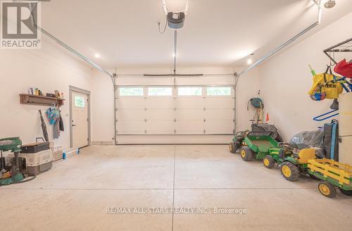 228 Riverside Drive, Kawartha Lakes, ON - Indoor Photo Showing Garage