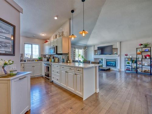 2089 Bowron Street, Kelowna, BC - Indoor Photo Showing Kitchen With Fireplace