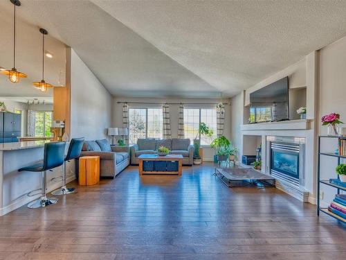 2089 Bowron Street, Kelowna, BC - Indoor Photo Showing Living Room With Fireplace