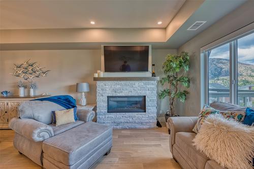 14-2161 Upper Sundance Drive, West Kelowna, BC - Indoor Photo Showing Living Room With Fireplace