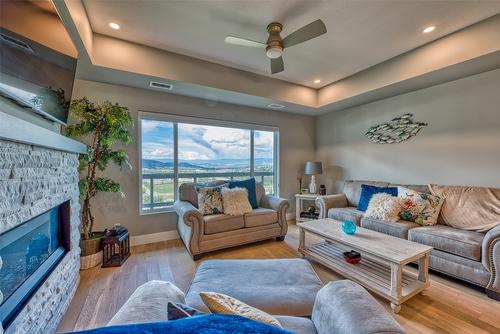 14-2161 Upper Sundance Drive, West Kelowna, BC - Indoor Photo Showing Living Room With Fireplace