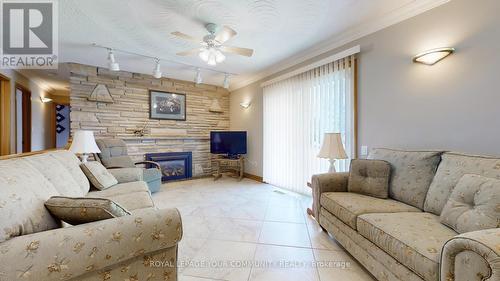 4616 Hwy 89 Road, Innisfil, ON - Indoor Photo Showing Living Room With Fireplace