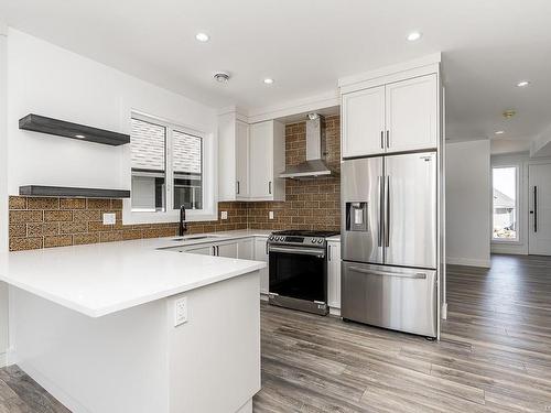 677 Briarwood Dr, Parksville, BC - Indoor Photo Showing Kitchen With Stainless Steel Kitchen With Upgraded Kitchen