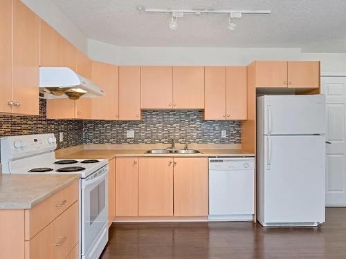 203-383 Wale Rd, Colwood, BC - Indoor Photo Showing Kitchen With Double Sink