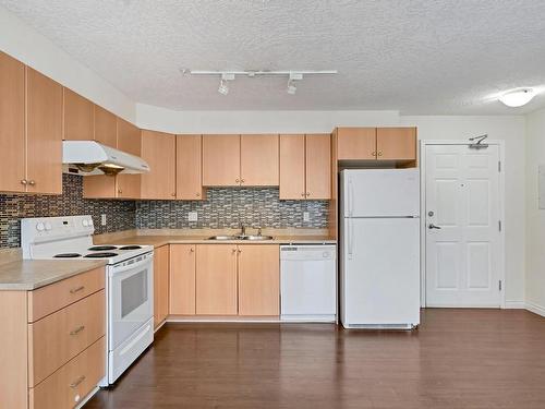 203-383 Wale Rd, Colwood, BC - Indoor Photo Showing Kitchen With Double Sink