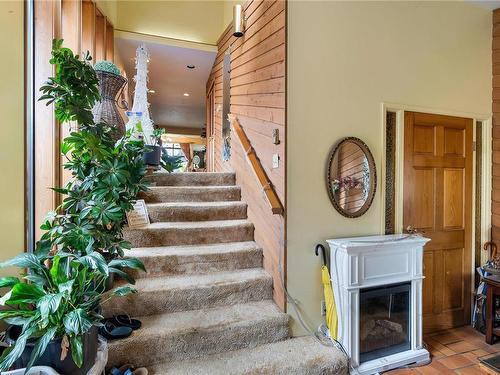 1550 Mileva Lane, Saanich, BC - Indoor Photo Showing Other Room With Fireplace