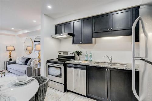 40 Arlington Crescent|Unit #40, Guelph, ON - Indoor Photo Showing Kitchen With Double Sink
