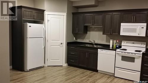 2226 St Patrick Avenue, Saskatoon, SK - Indoor Photo Showing Kitchen With Double Sink