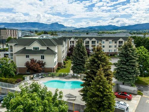 312-3160 Casorso Road, Kelowna, BC - Outdoor With In Ground Pool With View