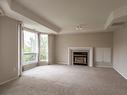 203-980 Dilworth Drive, Kelowna, BC  - Indoor Photo Showing Living Room With Fireplace 