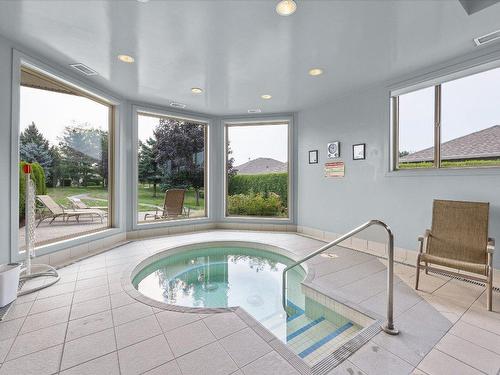 97-2365 Stillingfleet Road, Kelowna, BC - Indoor Photo Showing Other Room With In Ground Pool
