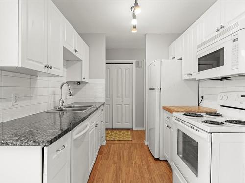 205-4101 Alexis Park Drive, Vernon, BC - Indoor Photo Showing Kitchen With Double Sink
