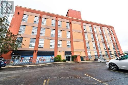 202 - 11 Rebecca Street, Hamilton, ON - Outdoor With Facade