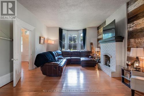 120 Main Street, Southwest Middlesex, ON - Indoor Photo Showing Living Room With Fireplace