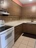 706 - 10 Tapscott Road, Toronto, ON  - Indoor Photo Showing Kitchen With Double Sink 